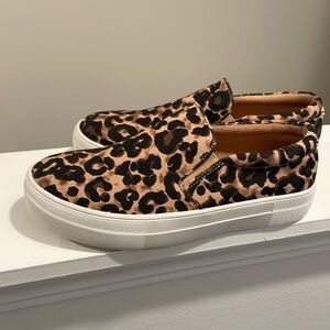 Steve Madden leopard print platform slip-on shoes.  They are slightly worn.